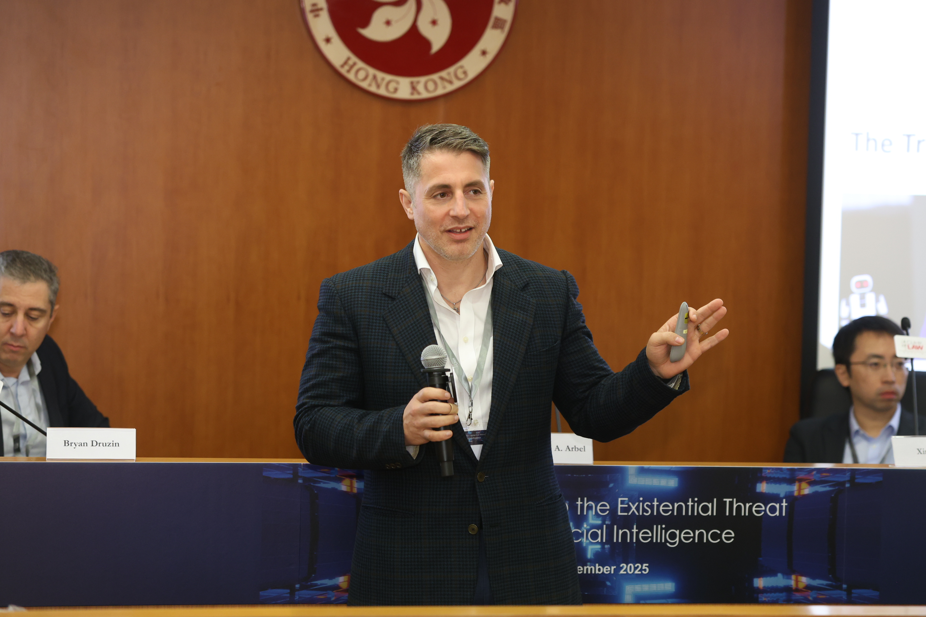 Yonathan Arbel speaking at a conference